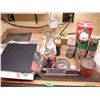 Image 1 : turtle wax, snowmobile oil, sand paper, etc.