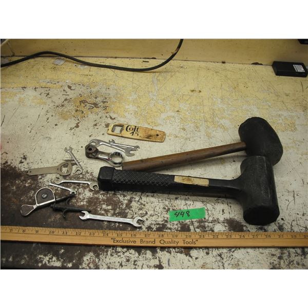 2 rubber mallets, assorted wrenches & tools, and colt 45 bottle opener