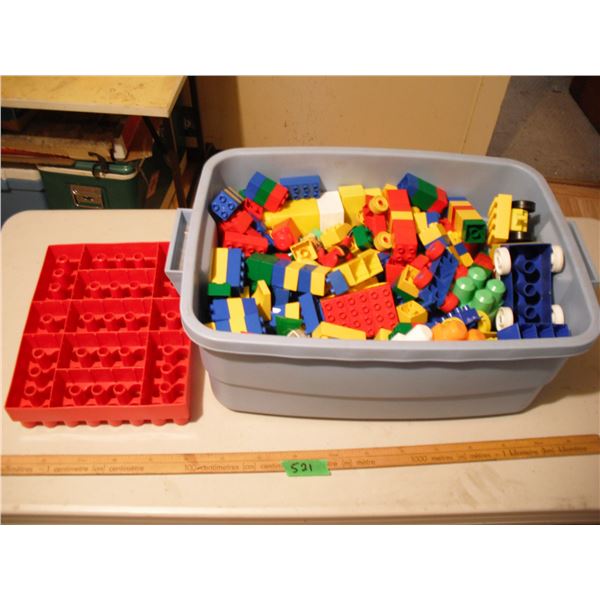 lot of mainly duplo bricks in tote
