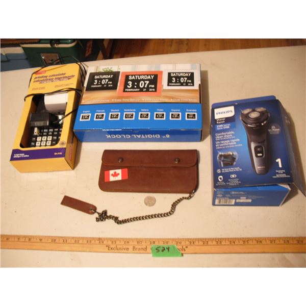 printing calculator, digital clock, and philips razor