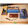 Image 1 : printing calculator, digital clock, and philips razor
