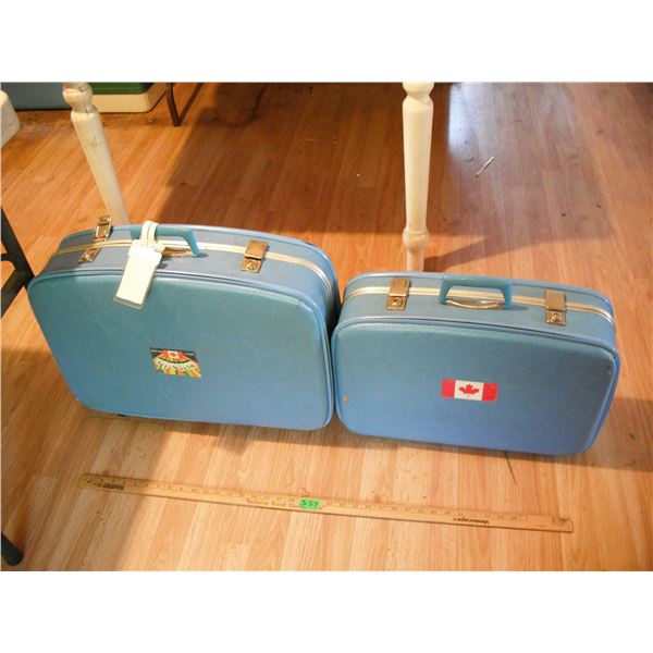 3 vintage suitcases