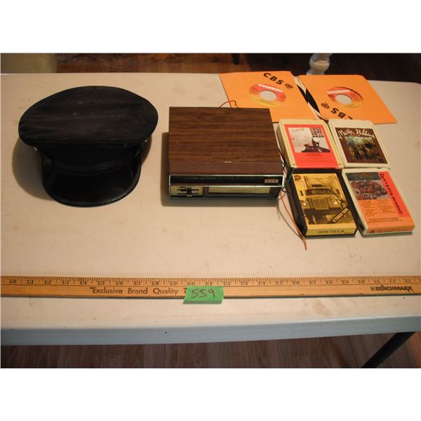 8 track, player, captains hat and 2 records