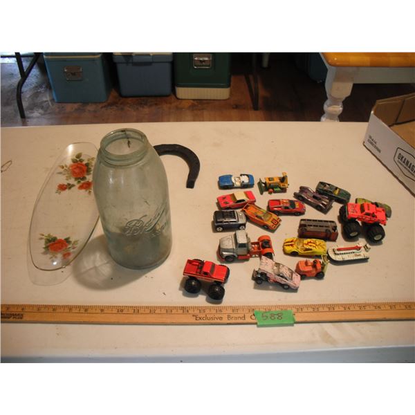 toy cars, horseshoe, tray and Ball mason jar
