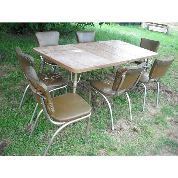 dining table and 7 chairs. Table is 6ft with 2 leaves in