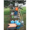 Image 1 : 2 shelves, water jugs, garden tools, electric fencer, etc.