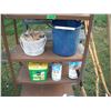 Image 3 : 2 shelves, water jugs, garden tools, electric fencer, etc.