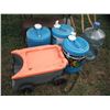 Image 4 : 2 shelves, water jugs, garden tools, electric fencer, etc.