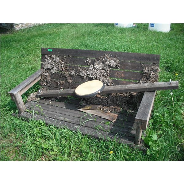 vintage wooden bench with deer thermometer