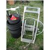 Image 1 : plant pots and hose reels