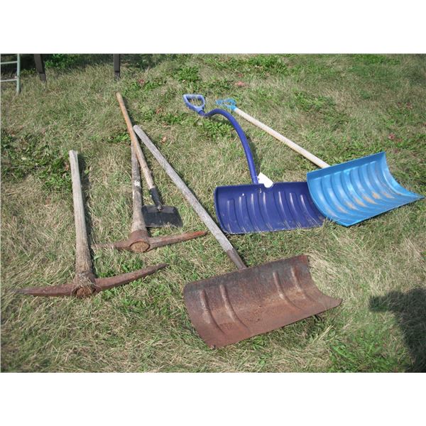 lot of shovels, edger, pickaxes