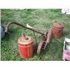 Image 4 : 2 metal gas cans and cast iron seeder