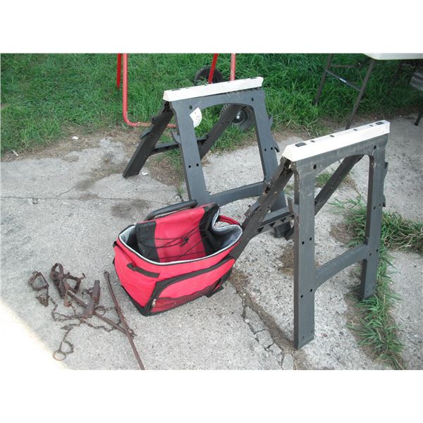 2 plastic saw horses, lunch bag and traps