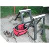 Image 1 : 2 plastic saw horses, lunch bag and traps