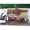 Image 2 : caulking gun, hand drill, torque wrench