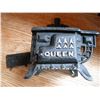 Image 4 : small cast décor and picture frames- Queen salesman sample stove