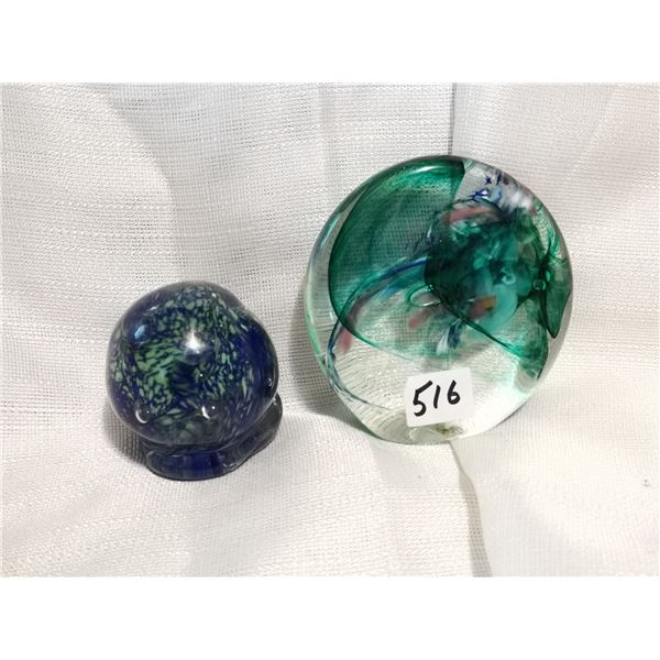 Two glass paper weights