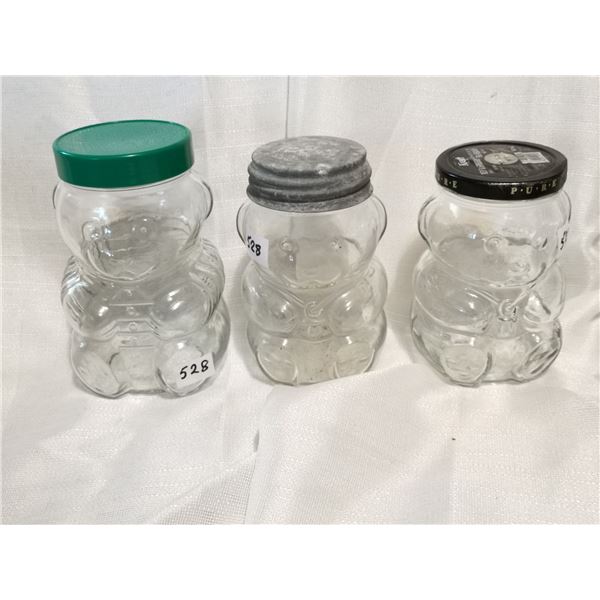Three glass bear jars