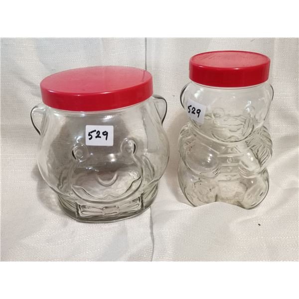 Two larger bear glass jars