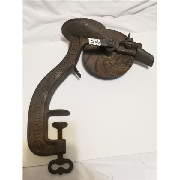 Antique cherry pitter