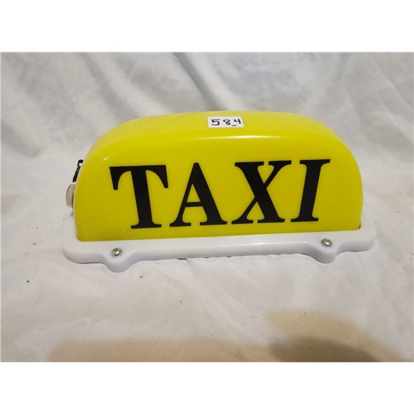 Light-up taxi sign, working gag item