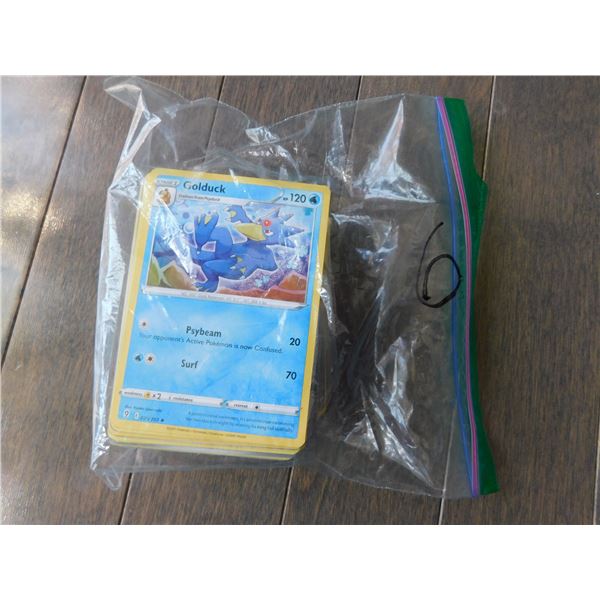 STACK OF POKEMON CARDS