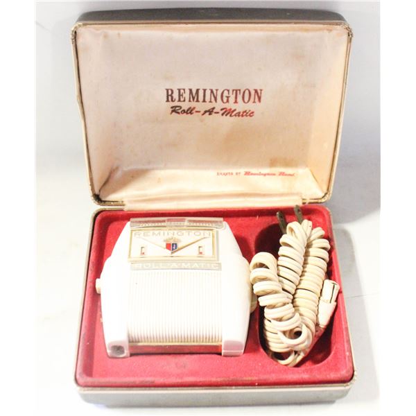 VINTAGE ROLL-A-MATIC SHAVER