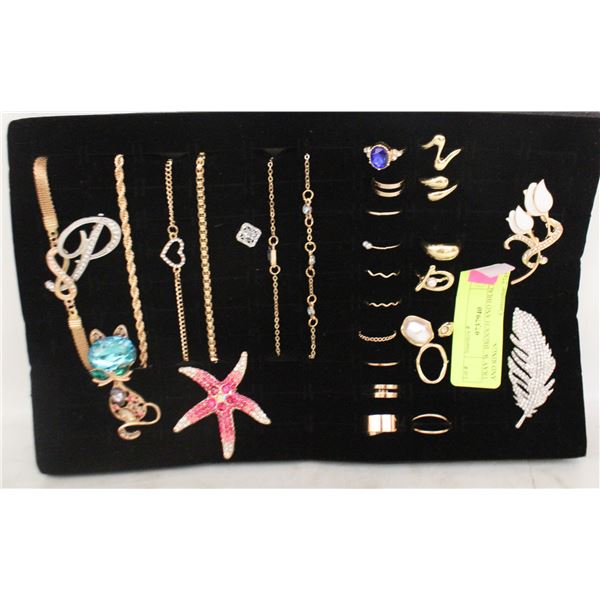 TRAY W/ BROOCH AND BRACELETS AND RINGS