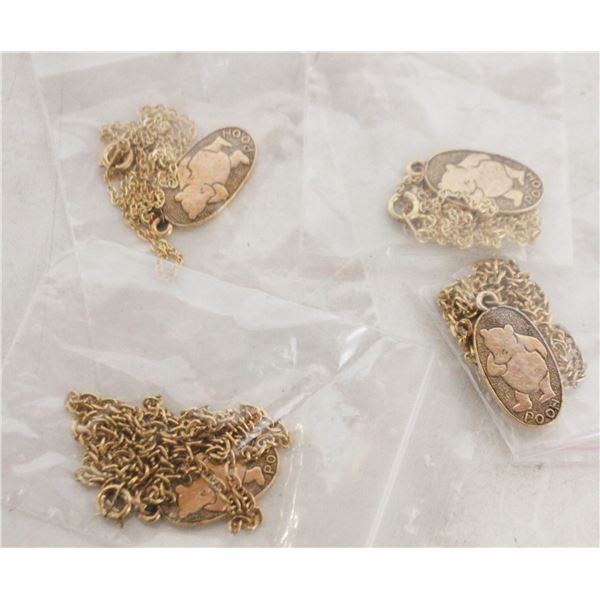 ESTATE BUNDLE OF POOH BEAR GOLD PLATED PENDANTS