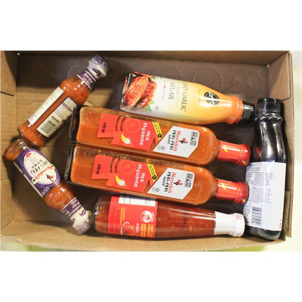 NEW SEALED BOTTLES OF PERI PERI SAUCE WITH BBQ