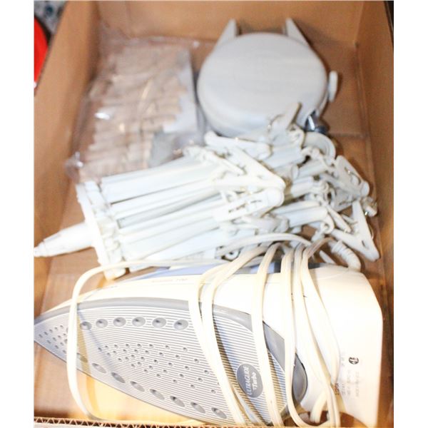 RETRACTABLE CLOTHESLINE WITH PEGS IRON AND OTHER
