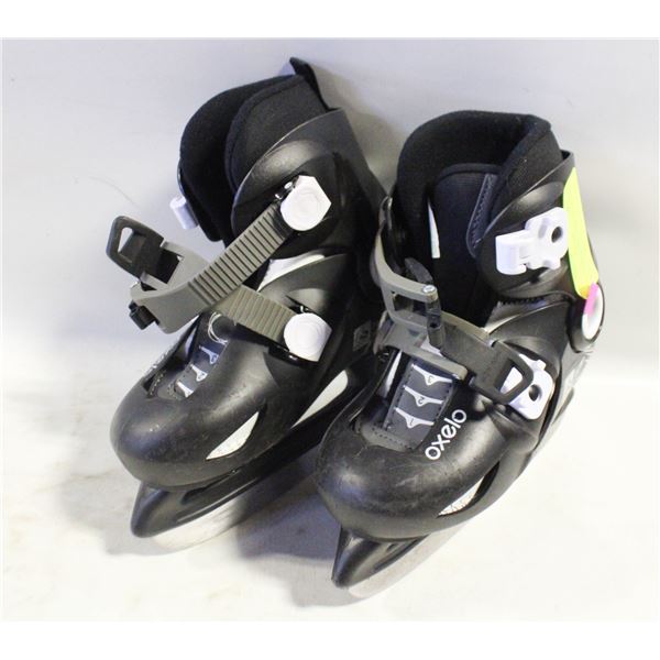 OXELO CHILDRENS SZ 9C/10.5C ICE SKATES - USED