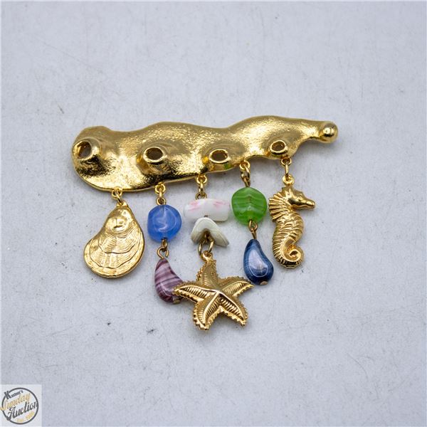 VINTAGE BEACH CHARM GOLD-TONE BROOCH