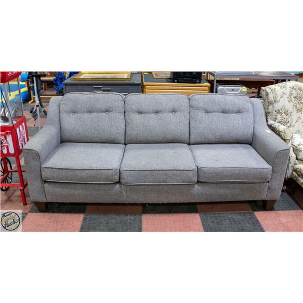 GREY FABRIC SOFA - HAS FABRIC FRAYING ON BOTTON