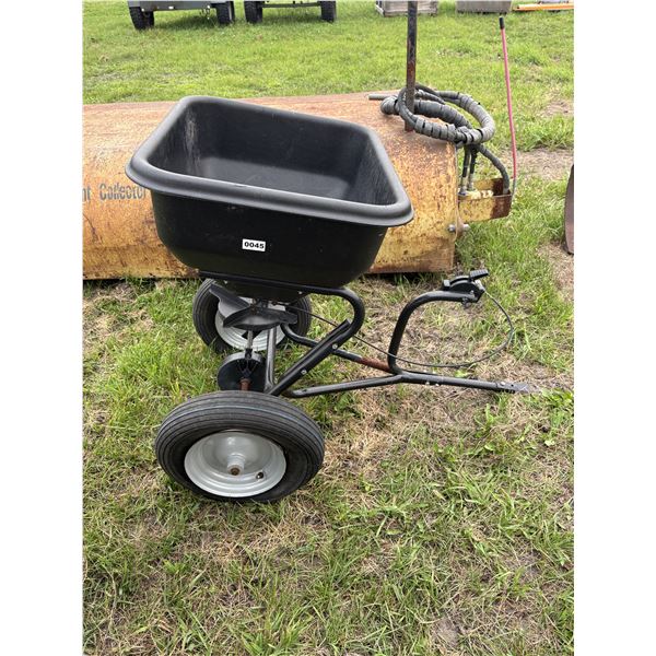Pull type lawn spreader