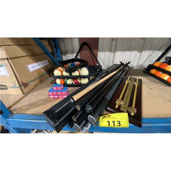 2 SETS OF BILLIARDS BALLS, ASSORTED CUES, SCOREBOARD, CUE CASE, TRIANGLE & WALL MOUNT CUE HOLDER
