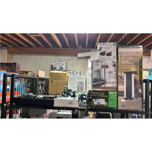 SHELF OF MASSAGE GUNS, STRING LIGHTS, TABLE LAMPS & CERAMIC HEATER: *WORKING CONDITION UNKNOWN/MAY