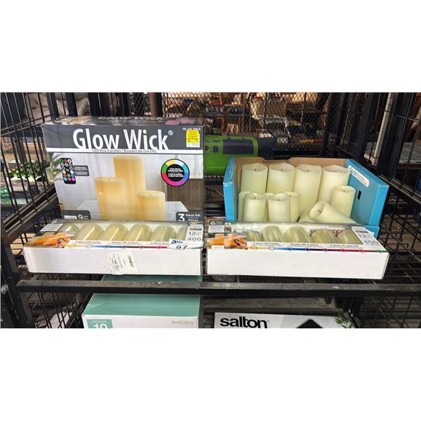 SHELF OF ASSORTED BATTERY OPERATED WAX PILLAR CANDLES:  *UNKNOWN WORKING CONDITION/MAY BE MISSING
