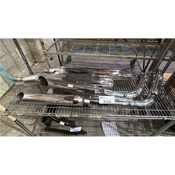 SHELF OF ASSORTED EXHAUST PIPES