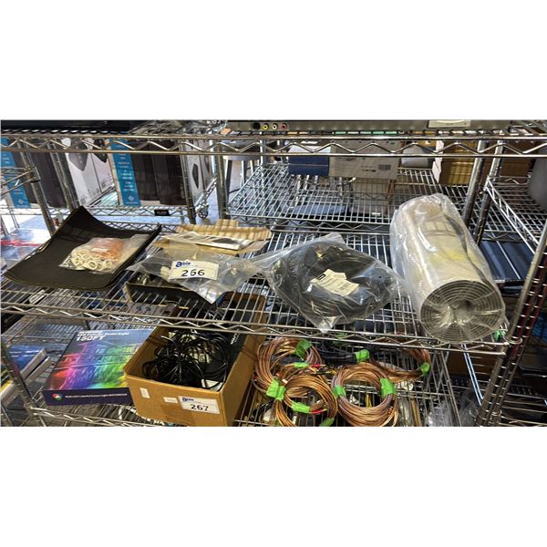 SHELF OF ASSORTED ITEMS INCLUDING LONG EXTENSION WIRE, SAND PAPER AND MORE