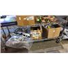 Image 1 : SHELF OF ASSORTED ITEMS INCLUDING POWER OUTLETS , SIDE BAGS AND MORE