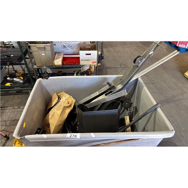 BIN OF EXERCISE MACHINE PARTS AND WEIGHT.