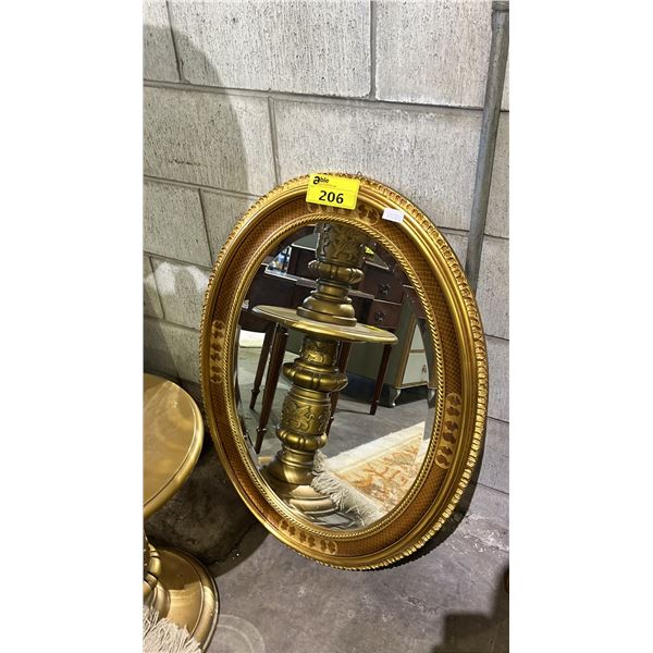 GILT FRAMED OVAL WALL MIRROR: APPROX. 34  X 25 
