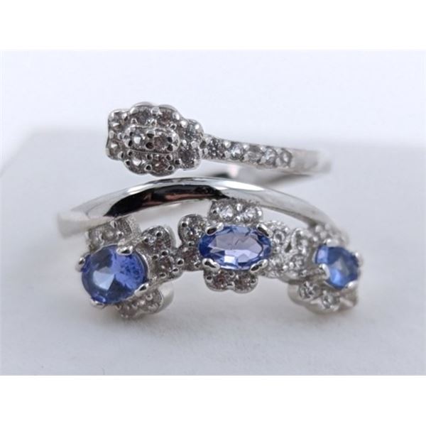 0.6 CT CERTIFIED SILVER TANZANITE GEMSTONE ($1,900 APPRAISAL)