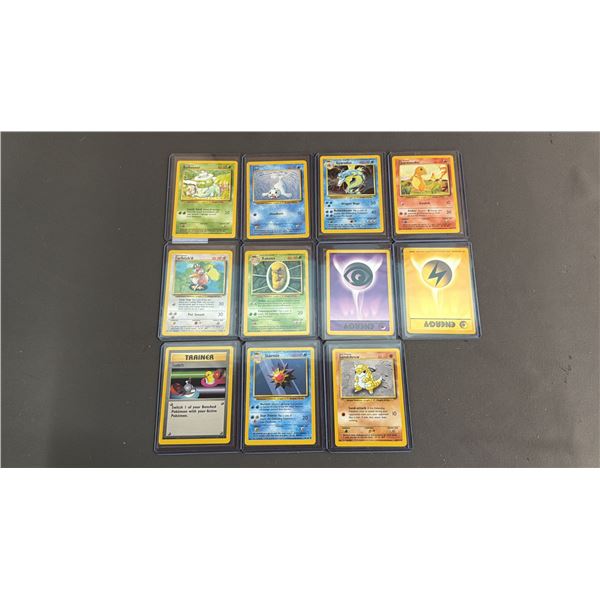 (11) ASSORTED POKEMON CARDS IN PROTECTIVE SLEEVES