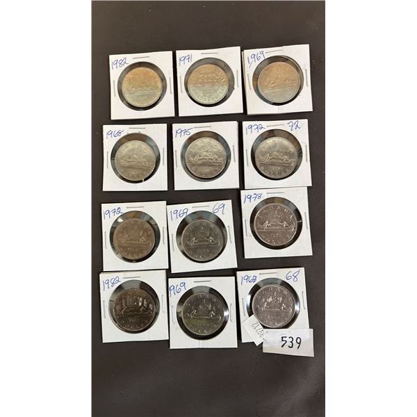 (12) VINTAGE CANADIAN CANOE DOLLARS