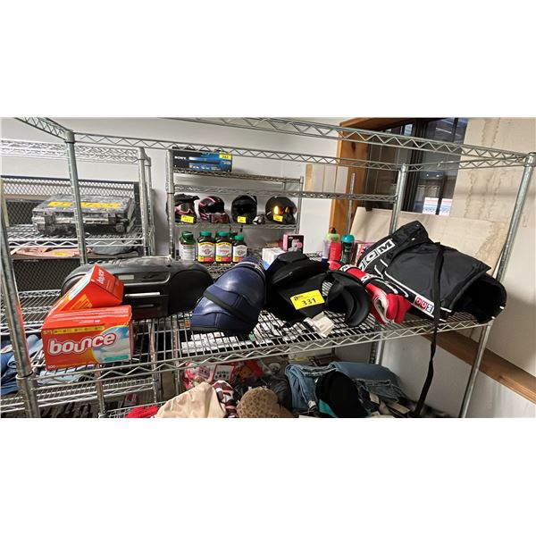 SHELF OF ASSORTED ITEMS INCLUDING HOCKEY GEARS, RADIO AND MORE