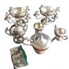 Image 1 : Rogers Silverplate Tea Set, Candlesticks, and Collector Spoons