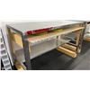 Image 2 : ULINE STAINLESS STEEL COMMERCIAL PREPARATION TABLE ON WOODEN BLOCKS APPROX 60"L X 30"D X 40"H
