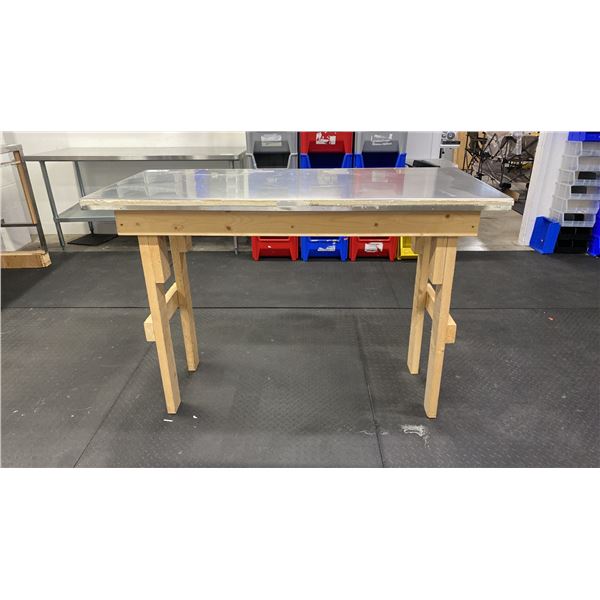 WOOD FRAME TABLE WITH STAINLESS STEEL TOP COVER APPROX 58"L X 26"D X 40"H